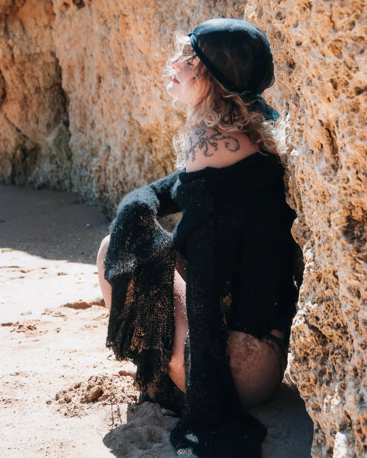 OFF-SHOULDER BLACK SWEATER