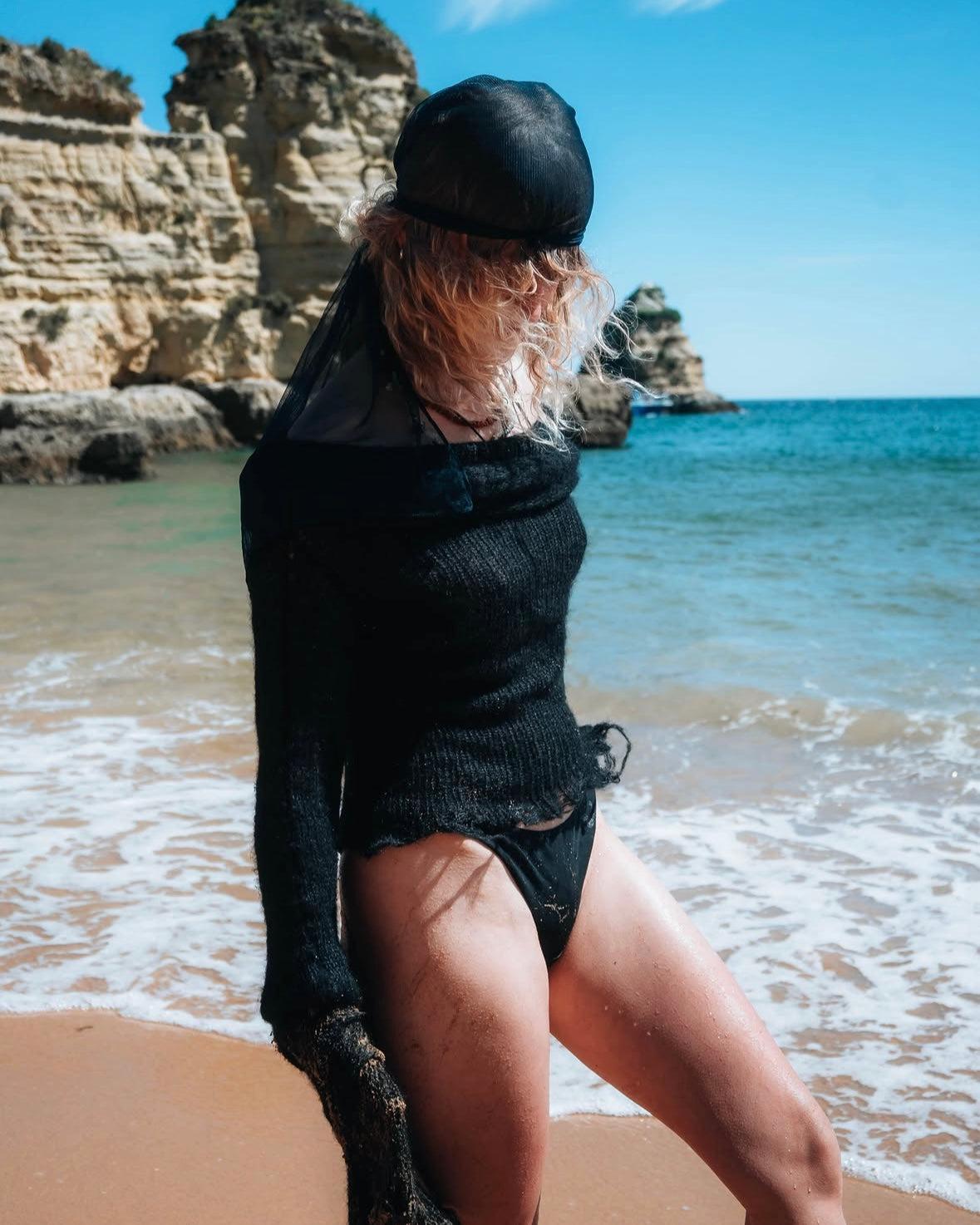 OFF-SHOULDER BLACK SWEATER